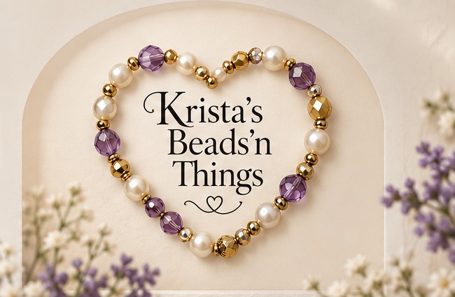 A heart-shaped bracelet made of purple, cream and gold beads surrounding the Krista’s Beads’n Things name